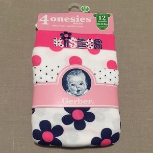 Pack of 4 new girls onesies. Pink, white, and navy